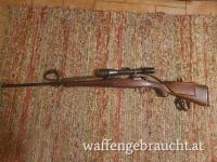 Repetiergewehr Mausersystem Kaliber 7x64 mit reichhaltiger Gravur und Eichenlaubschnitzerei