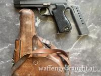 SIG P210 im hervorragenden Zustand mit Kaliber 9mm Para, zweitem Magazin und Originalholster 